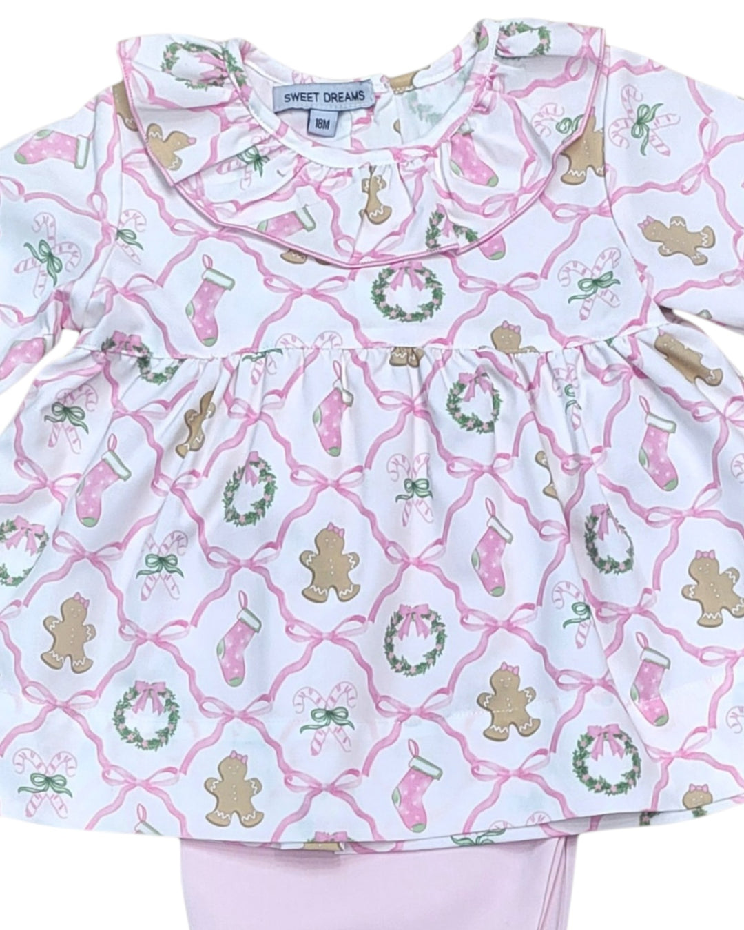 Children's pajama set with festive pattern on a white background