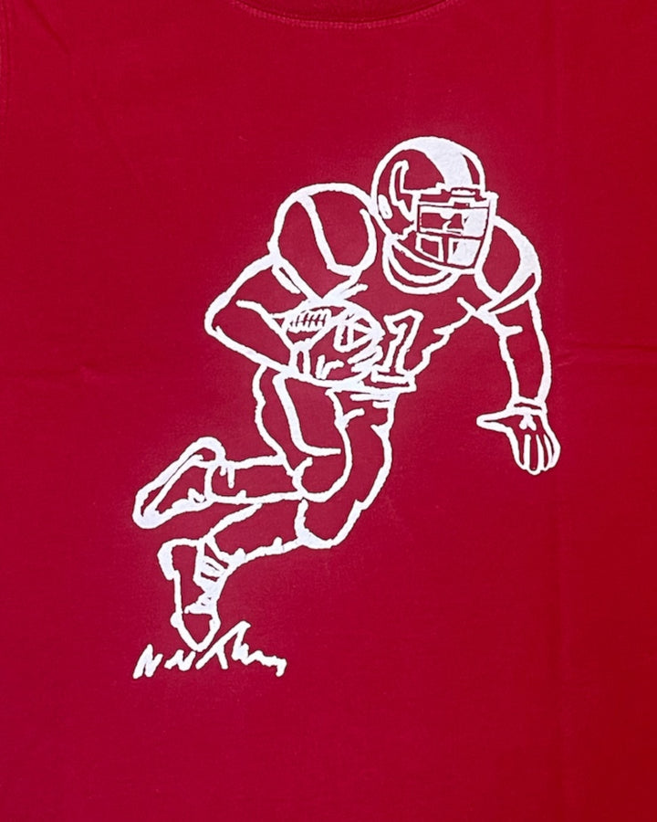Crimson shirt with white outline of a football player running and catching a ball.