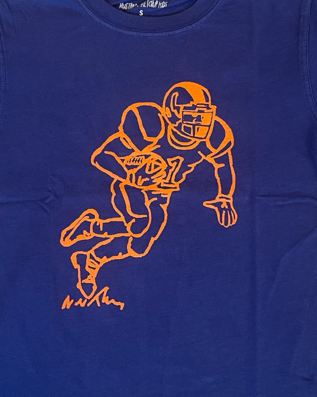 Blue t-shirt with orange football player graphic and signature