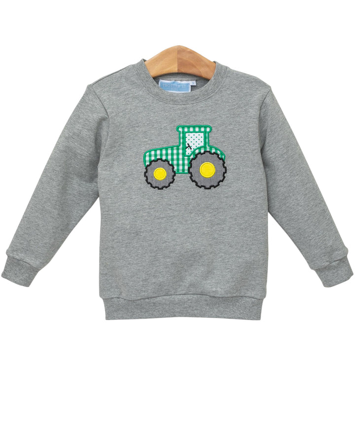 Gray sweatshirt with a green and yellow tractor design on a white background