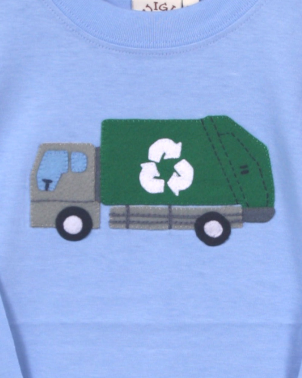 Blue shirt with a green recycling truck design on a light blue background