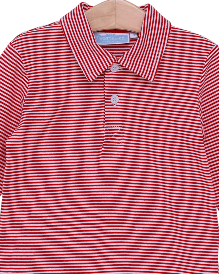 Red and white striped polo shirt on a hanger