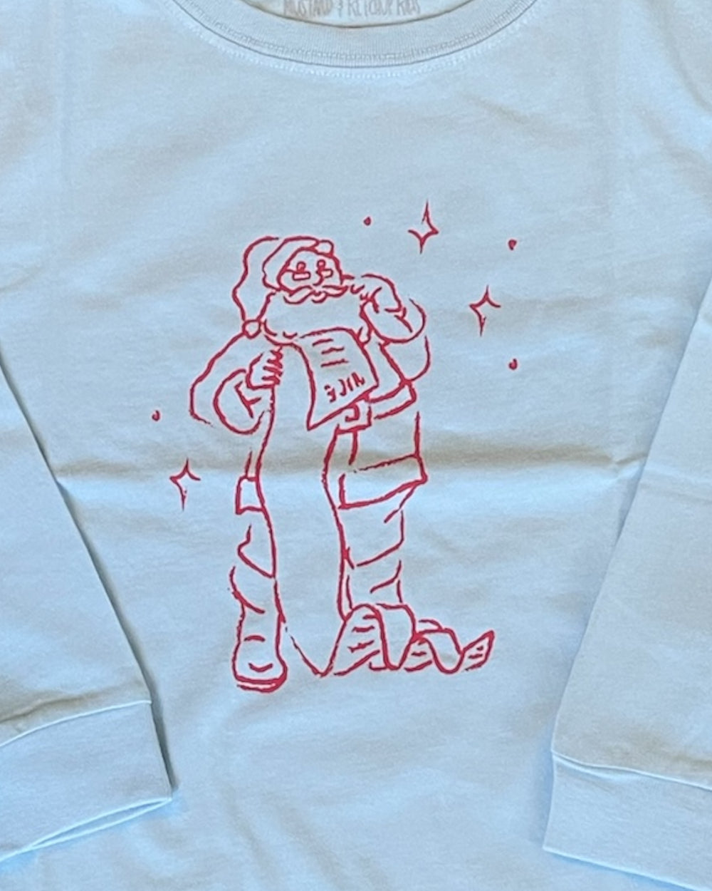 Light blue sweatshirt with red graphic print Santa Claus design on blue background