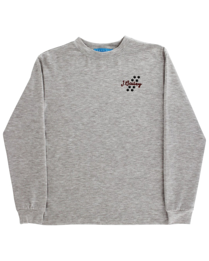 Gray tee with a logo on the chest against a white background