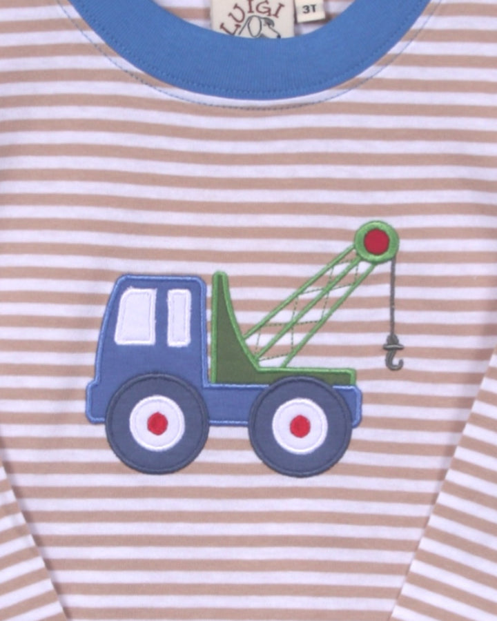 Children's outfit with a crane design on a striped background