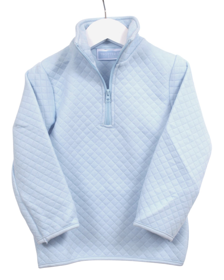 A light blue quilted quarter-zip pullover sweater hanging on a white hanger against a plain white background, that store