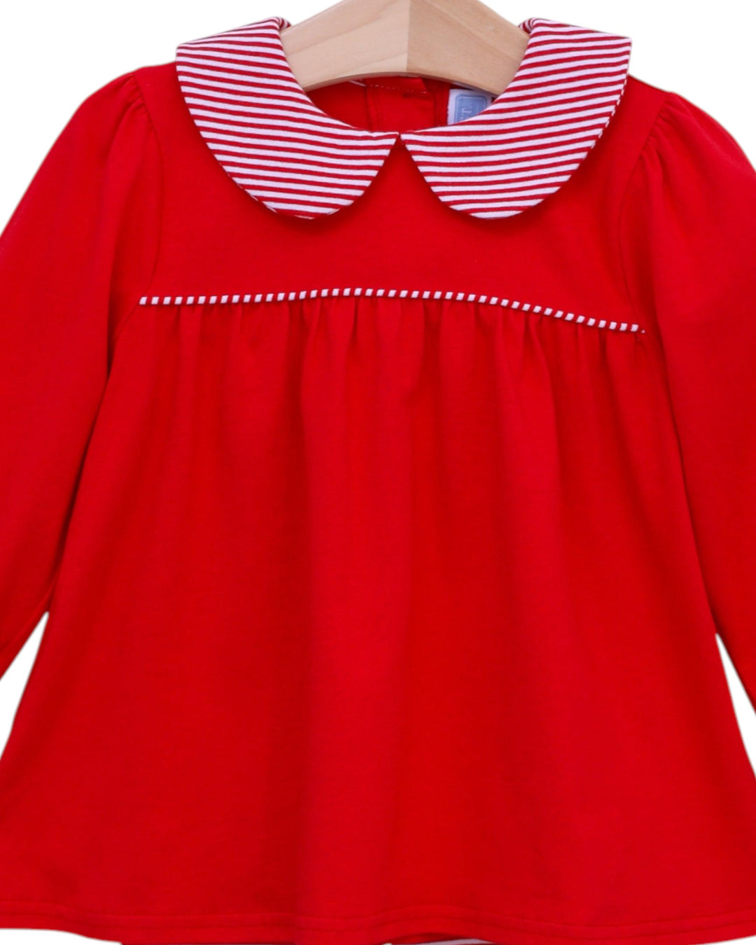 Red dress with a striped collar on a white background