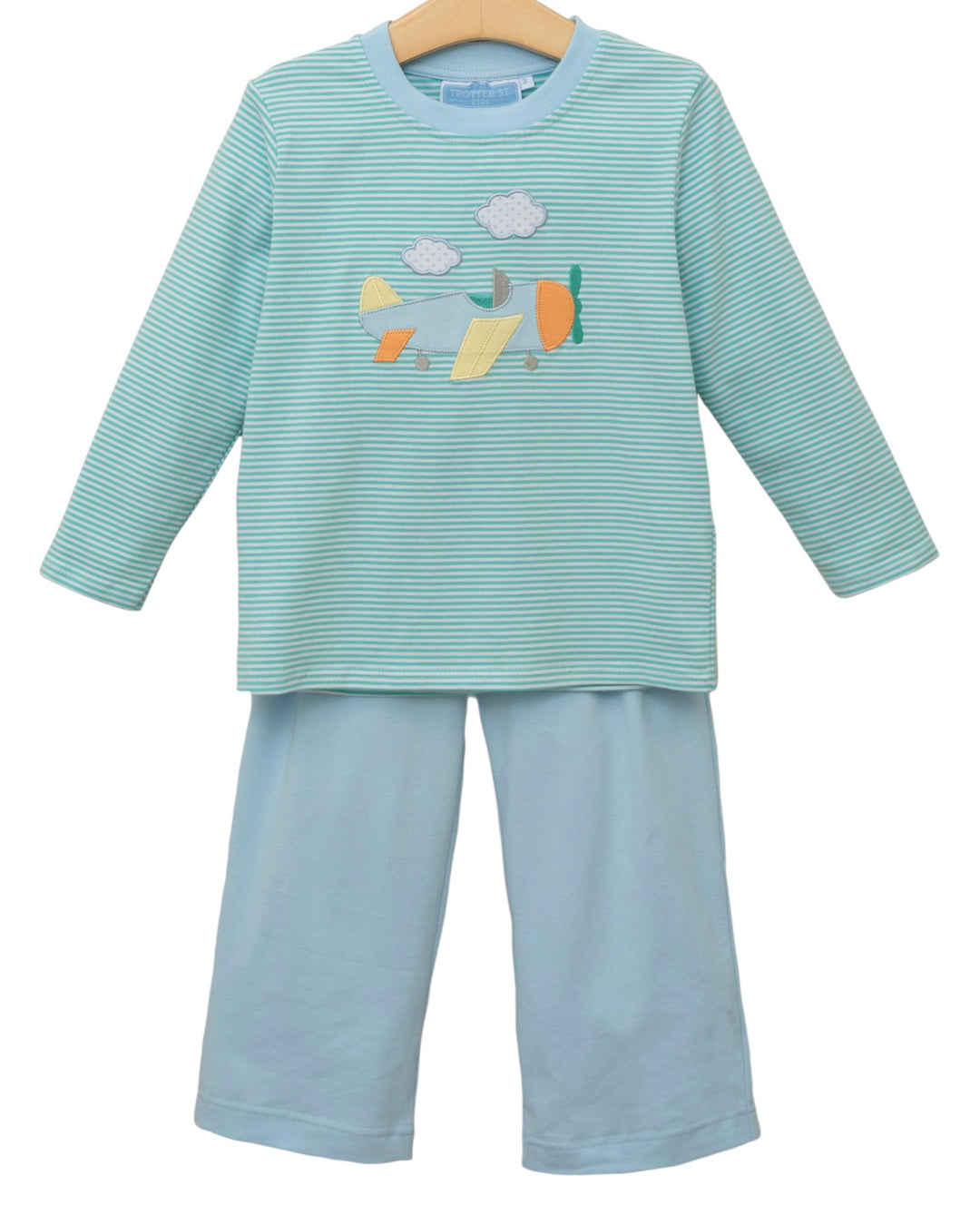 Children's outfit with a striped shirt and pants on a white background
