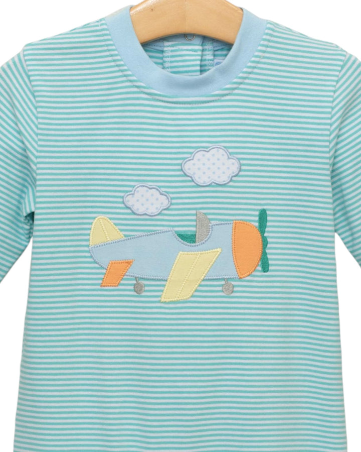 Children's t-shirt with airplane and cloud design on a hanger
