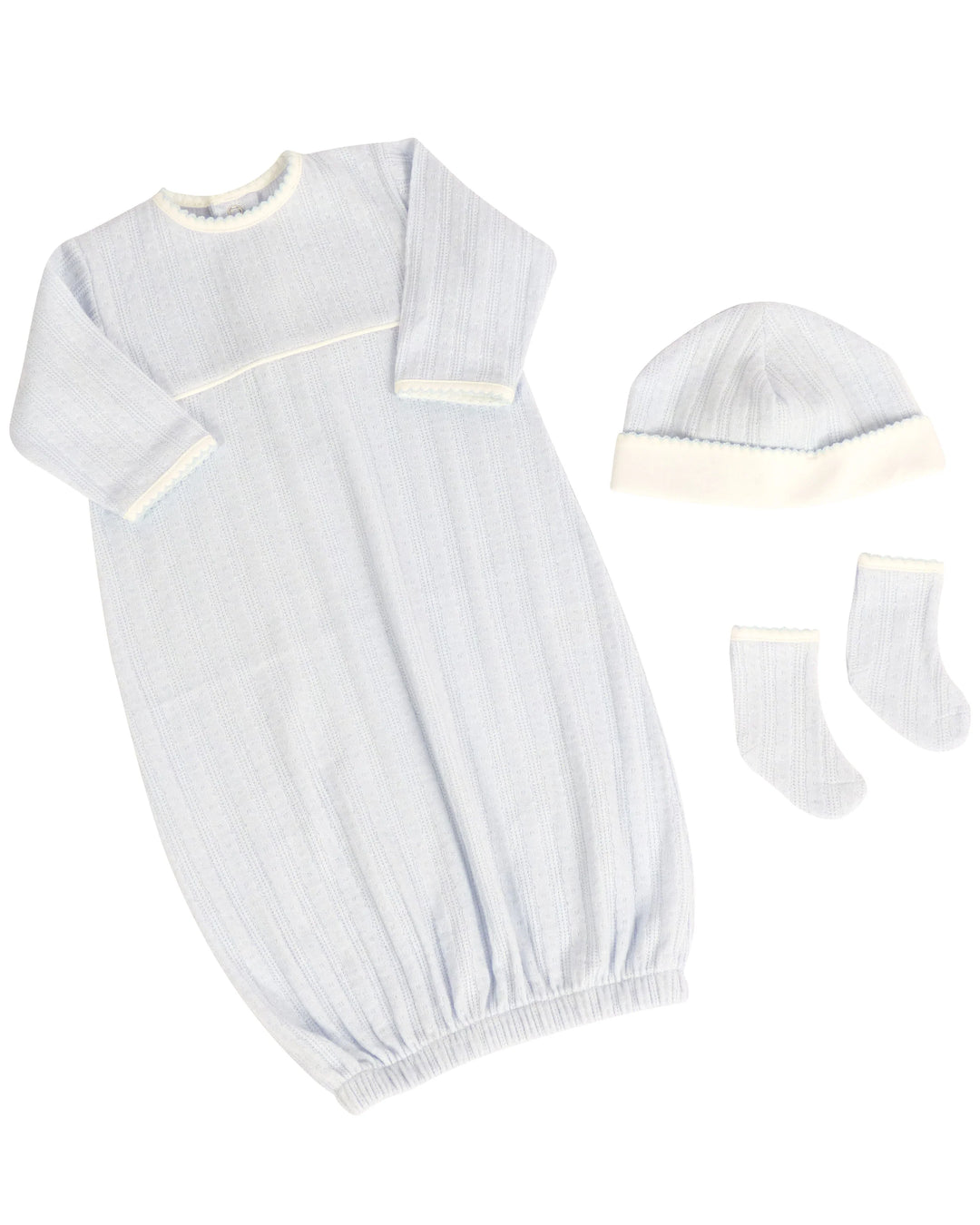 Baby sleeping bag, hat, and socks set on a white background