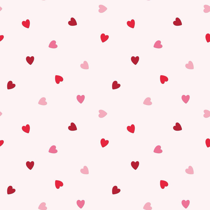 Pattern of red and pink hearts on a white background