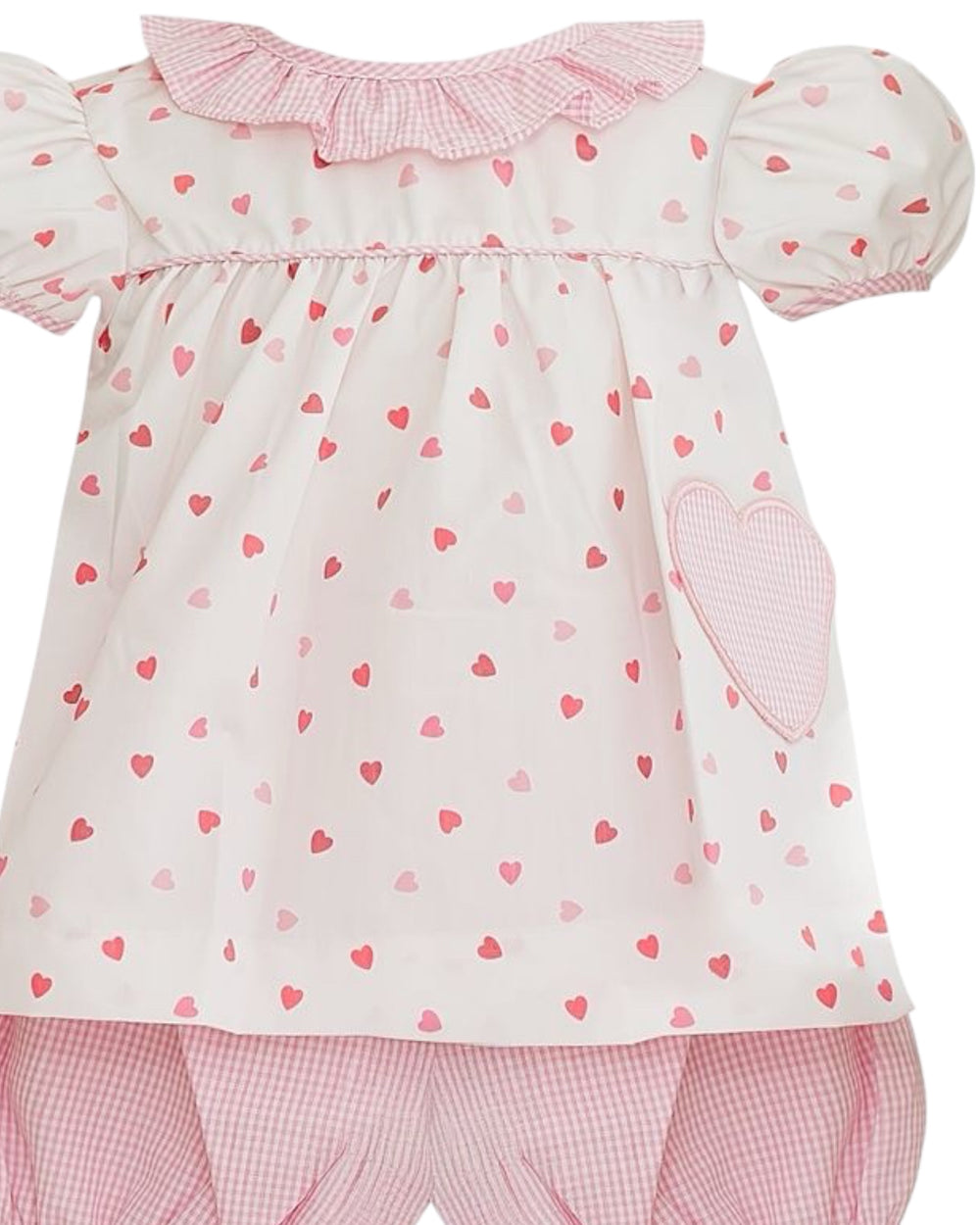 Baby outfit with pink heart pattern on a white background
