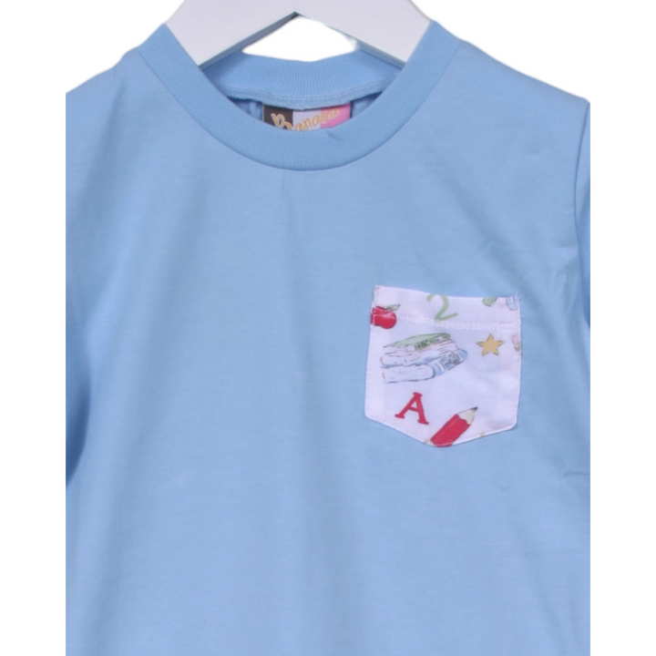 Light blue shirt with a pocket featuring educational-themed design on a white background