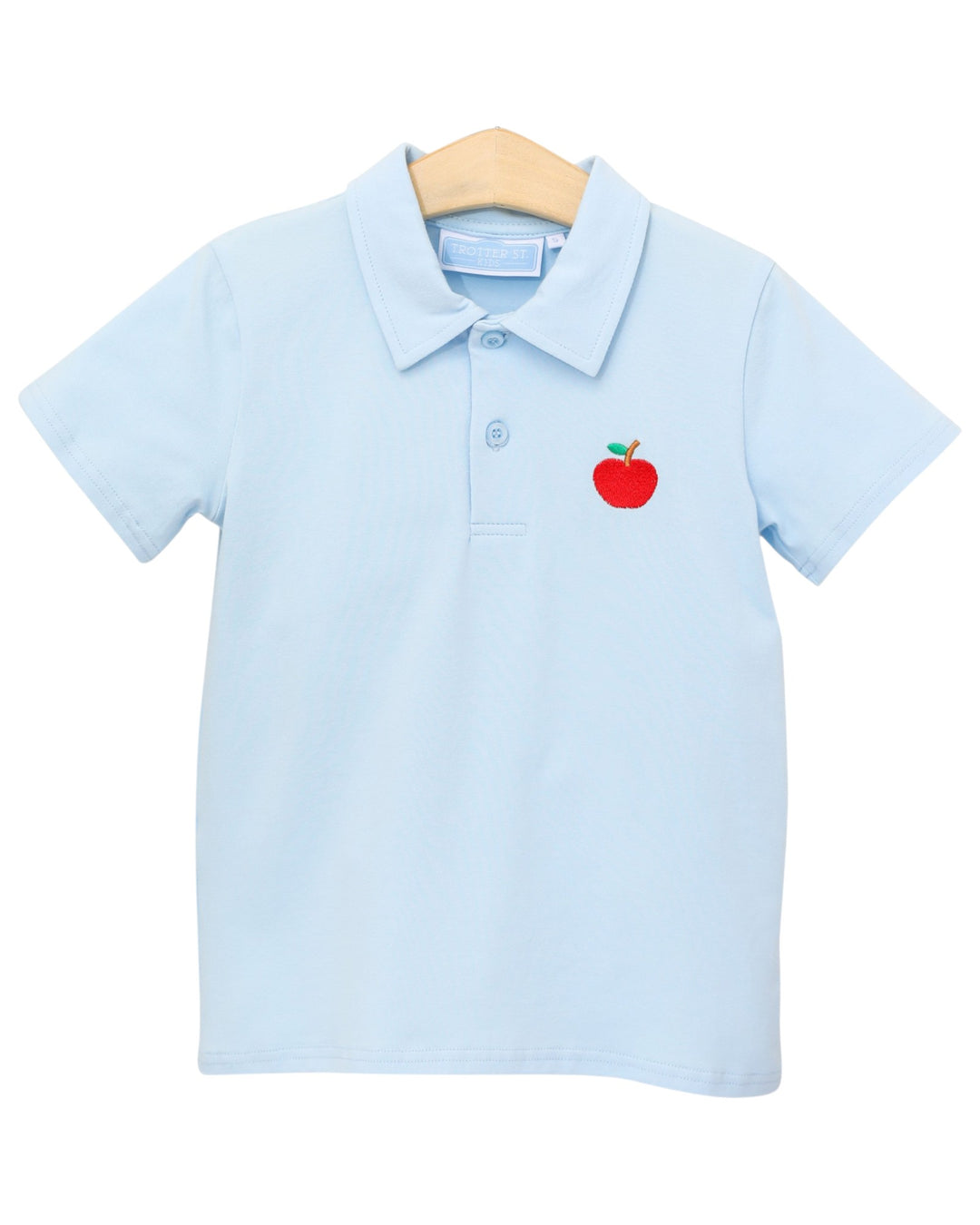 Light blue polo shirt with a red apple emblem on a white background