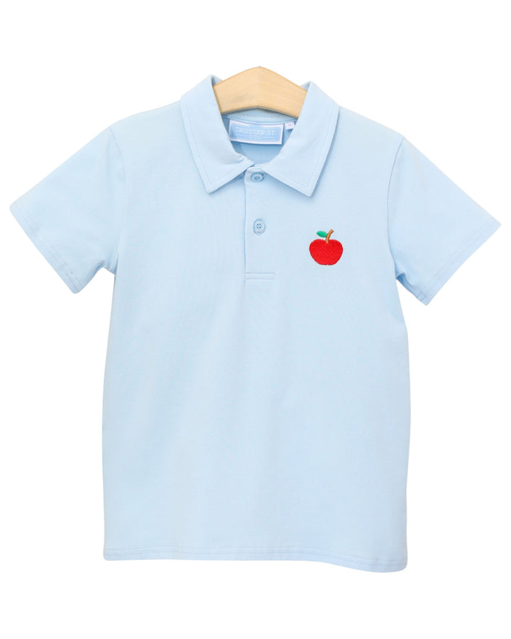 Light blue polo shirt with a red apple emblem on a white background