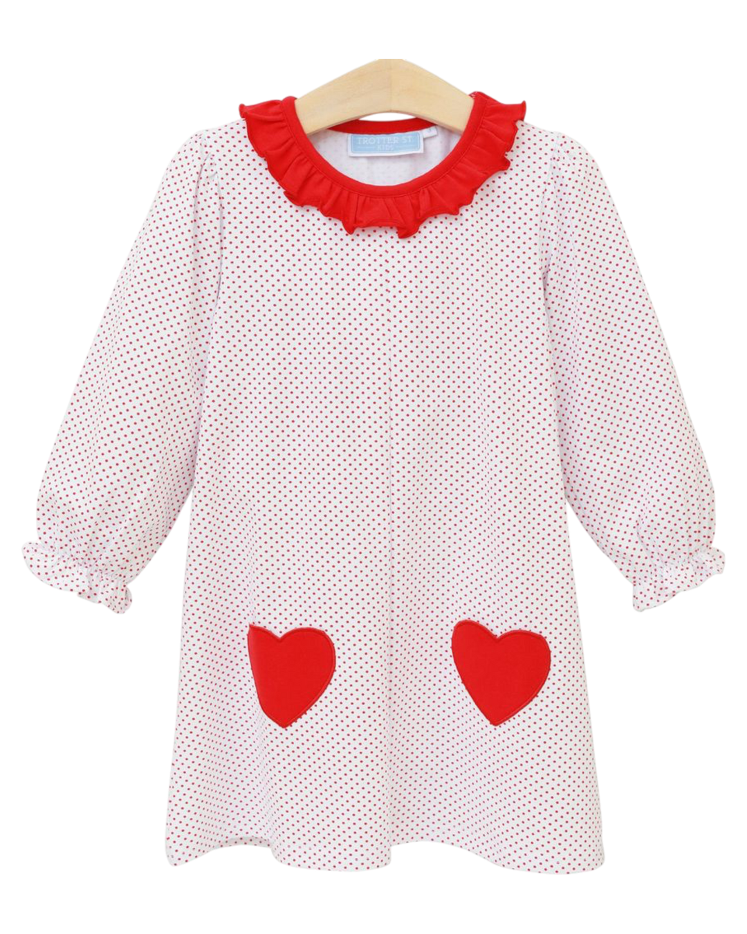White dress with red heart patterns and collar on a hanger
