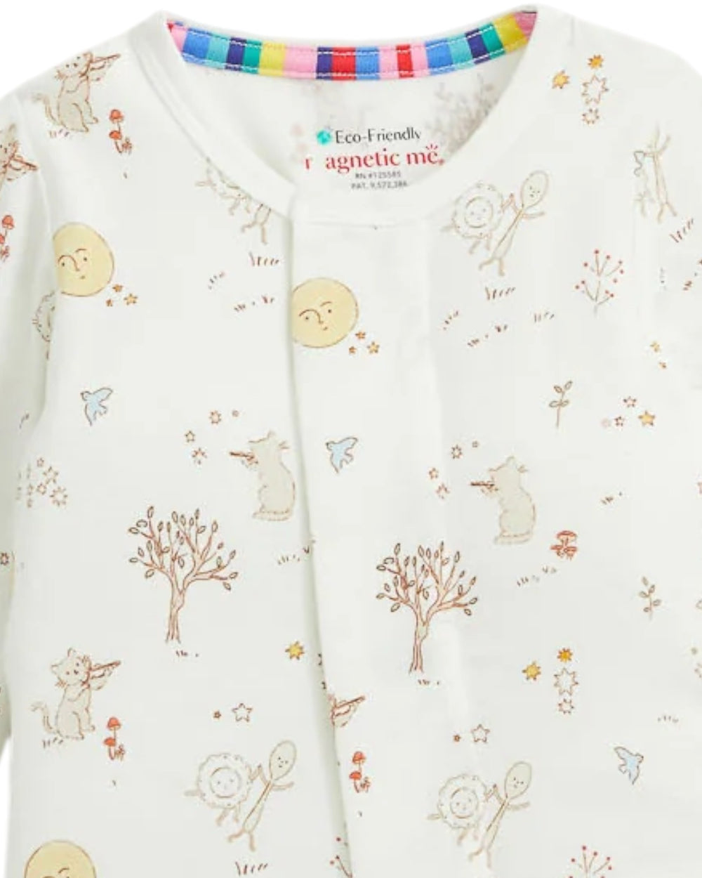 Close-up of a baby sleepwear top with a white background and a colorful cartoon print of animals, trees, and stars. The inner collar features a striped trim in multiple colors, and the brand label reads 'Eco-Friendly magnetic me', that store