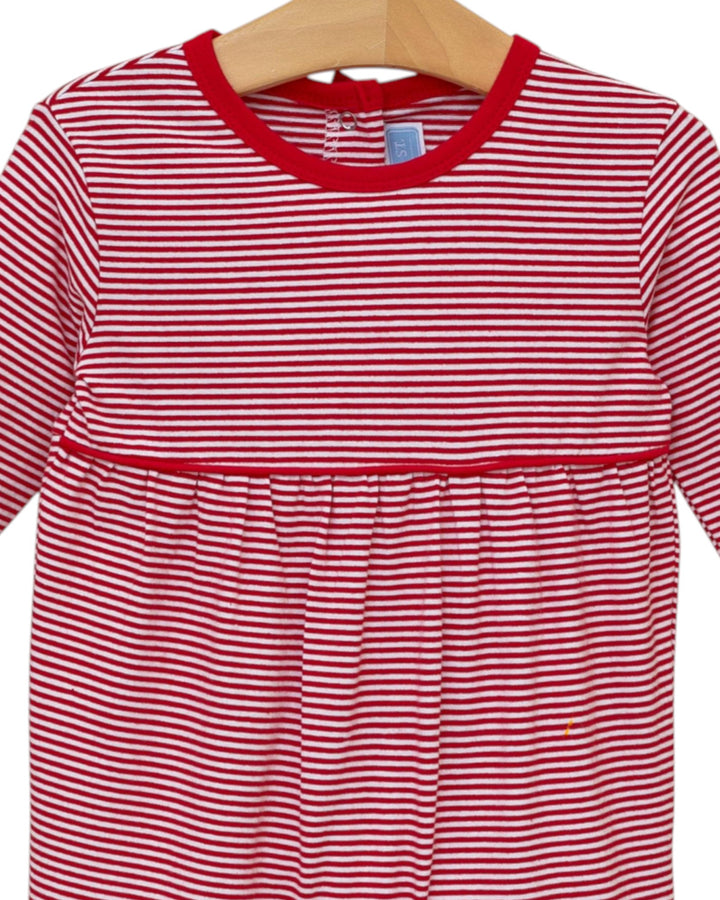 Red and white striped dress on a wooden hanger