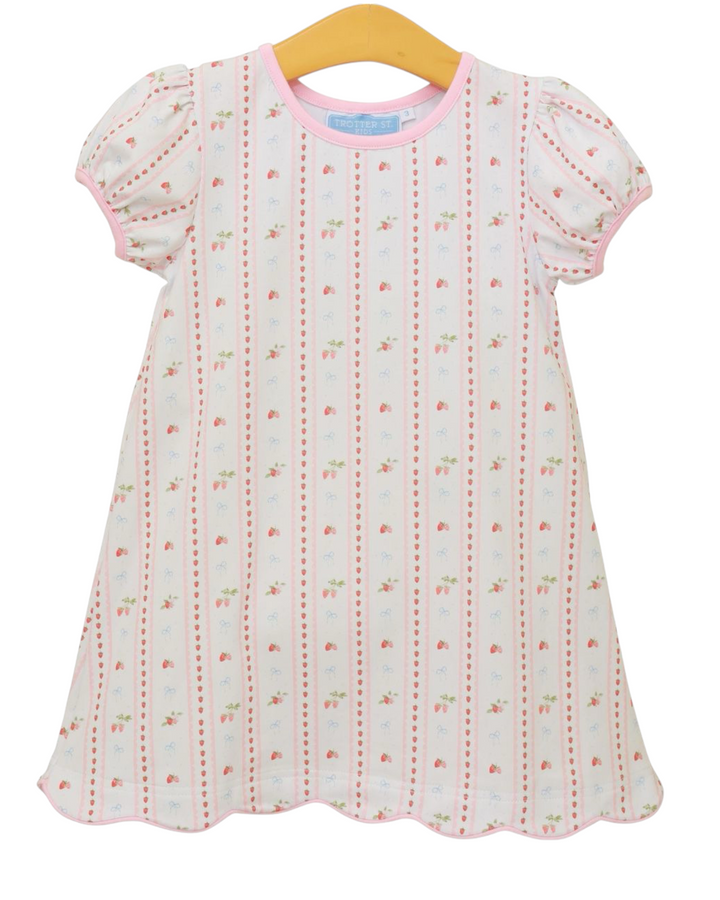 Baby dress with floral pattern on a white background