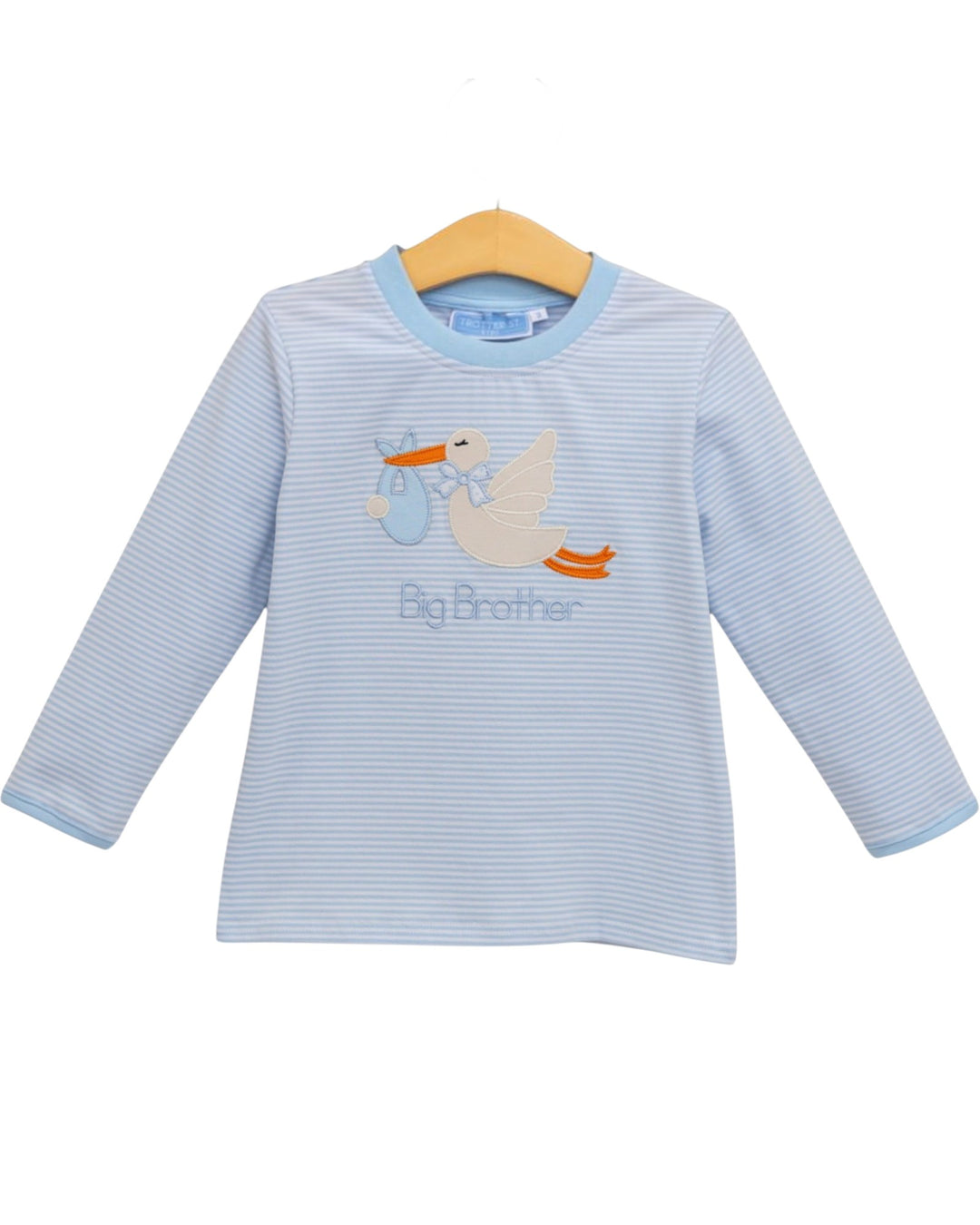 A light blue and white striped long-sleeve baby t-shirt with a cartoon stork graphic and the text 'Big Brother' on the front, hanging on a wooden hanger against a white background, that store