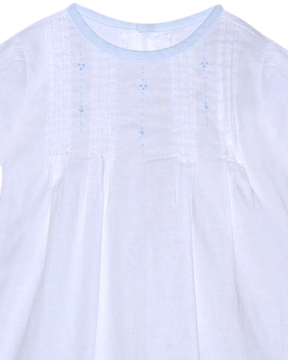 Close-up of a light blue shirt with subtle patterns