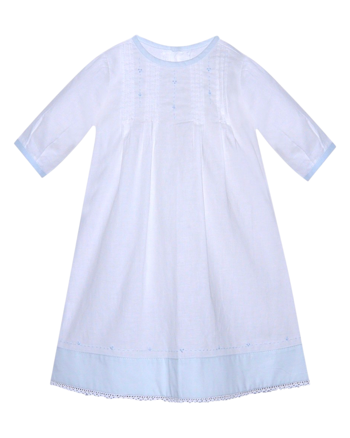 Light blue dress with lace trim on a white background