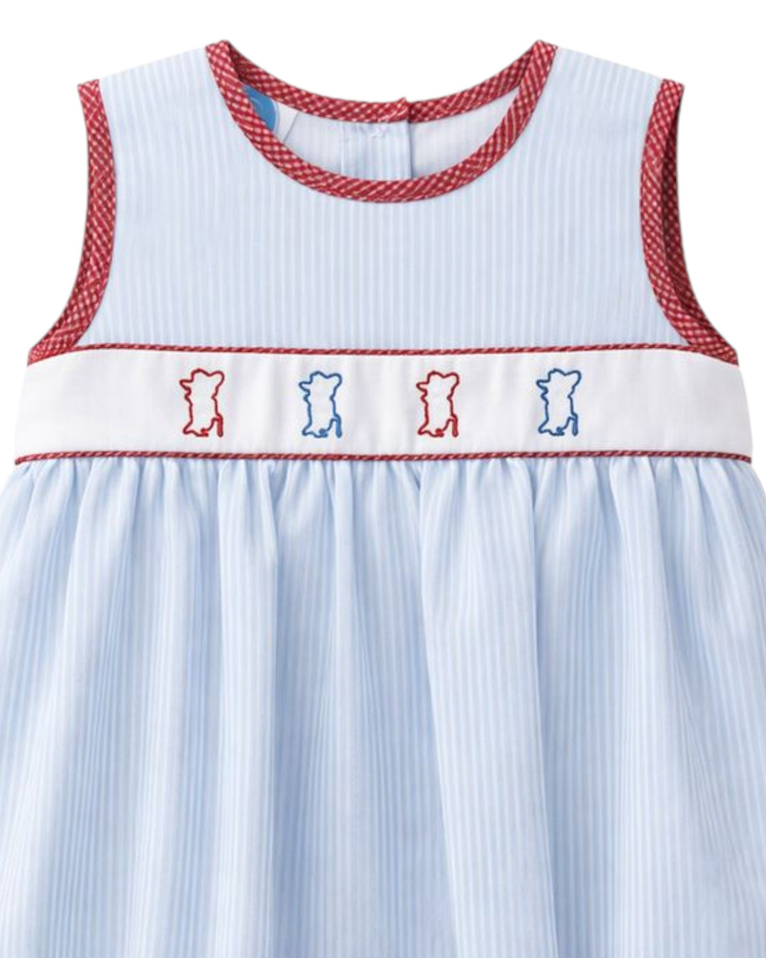 Children's dress with red trim and embroidered bears on a white background