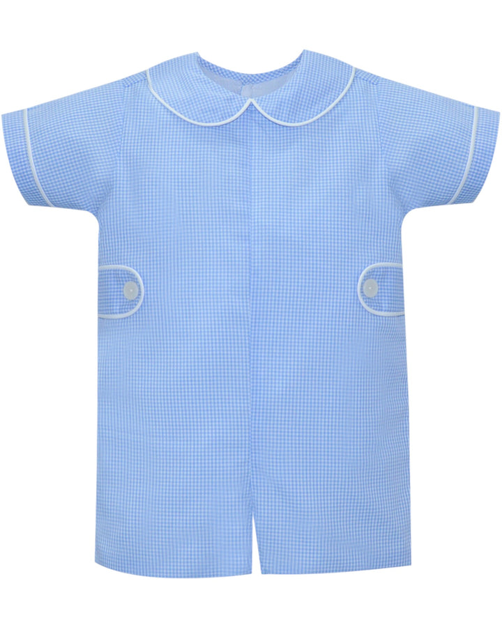 Blue checkered baby romper with white trim on a white background