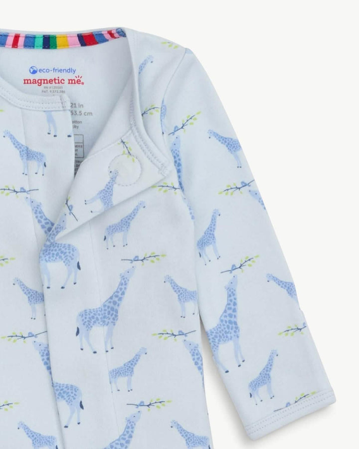 Baby onesie with giraffe pattern on a light blue background