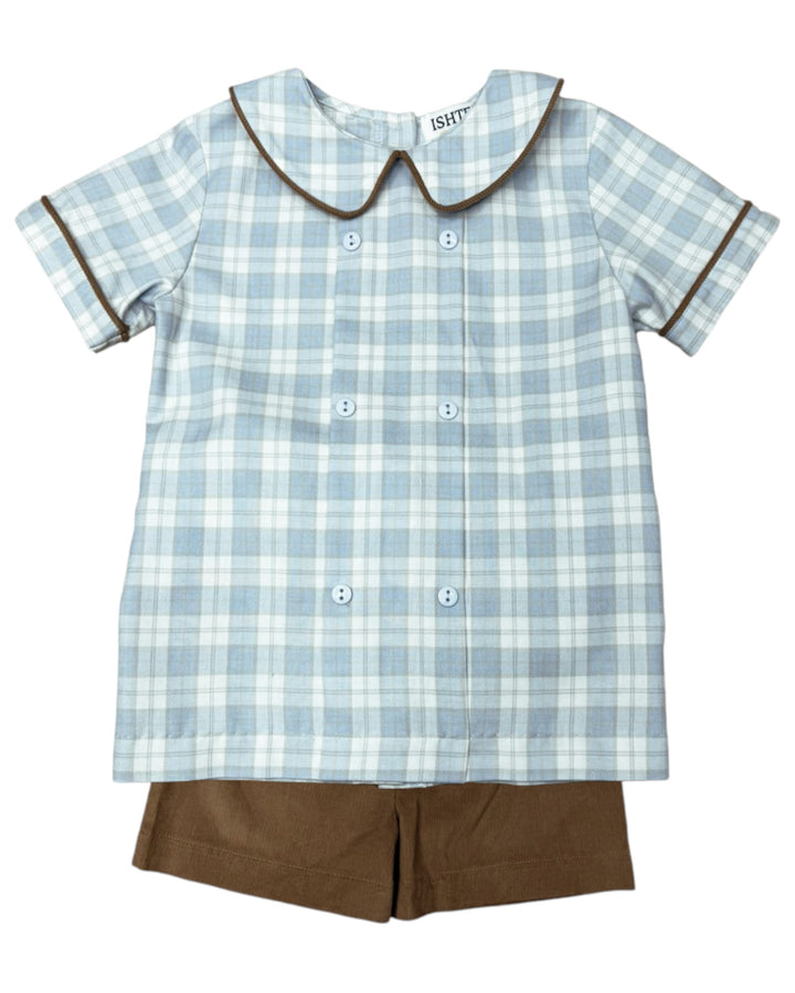 Children's outfit with blue plaid shirt and brown shorts on a white background