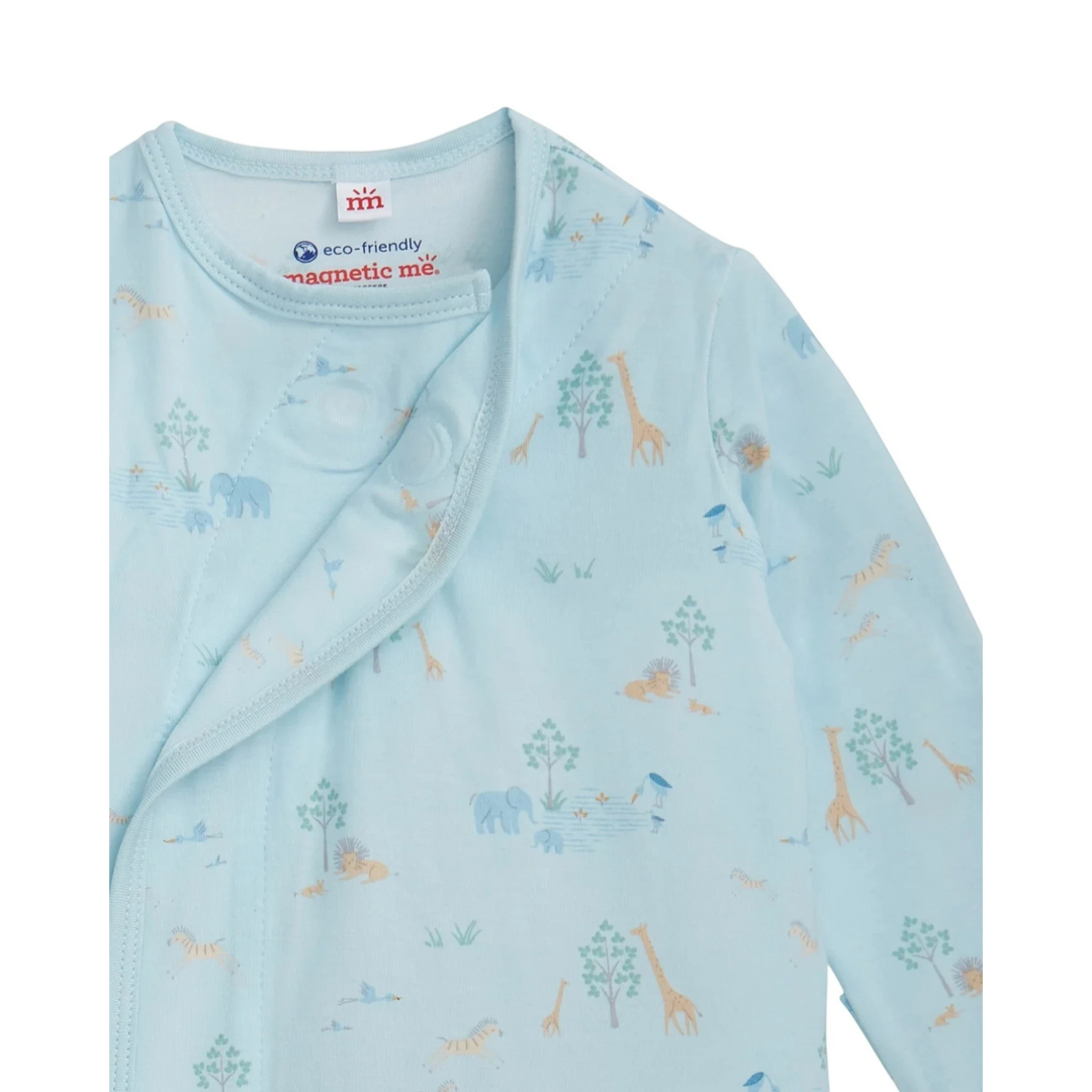 Light blue baby onesie with animal prints on a white background