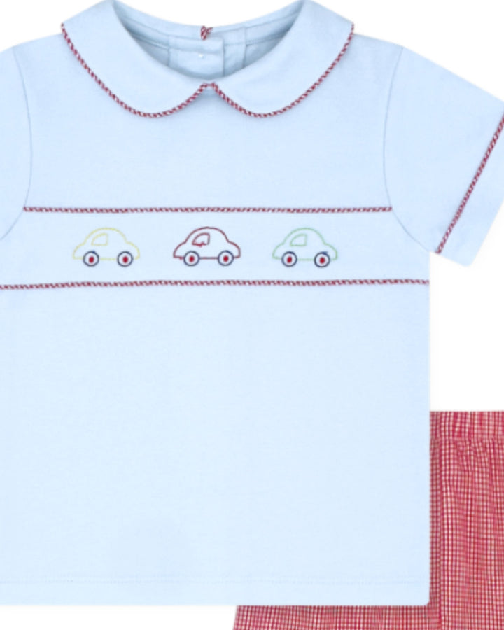 Light blue shirt with embroidered cars and red checkered pants