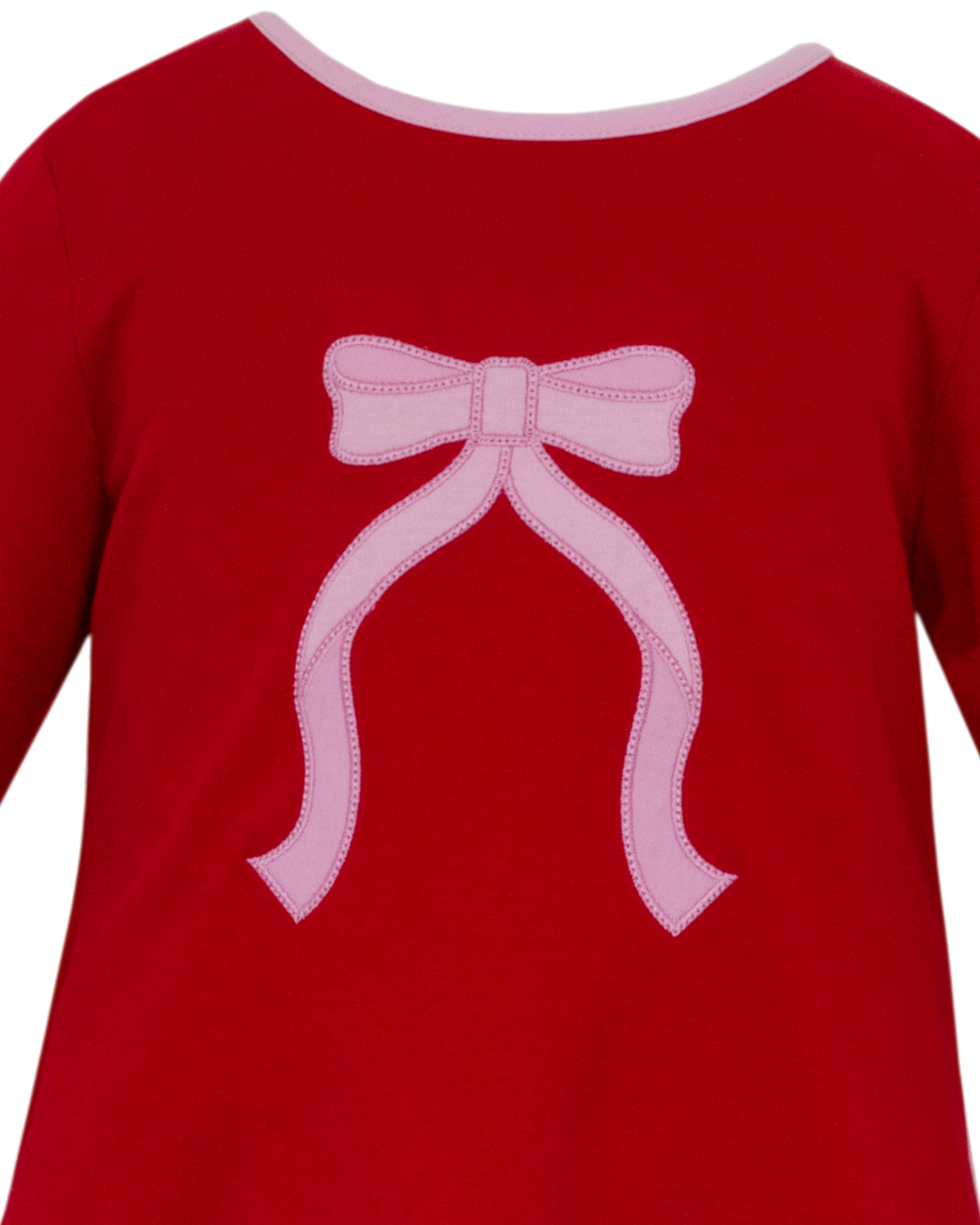 Red shirt with a pink bow design on a white background
