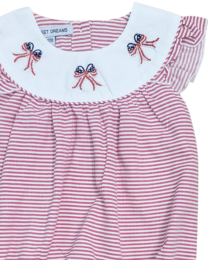 Red and white striped dress with embroidered bows on a white background, that store