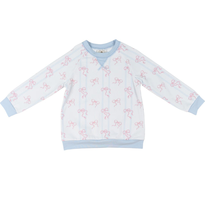 A light blue and white long-sleeve baby sweatshirt with pink bow patterns, featuring a half-button front and ribbed cuffs and hem, that store