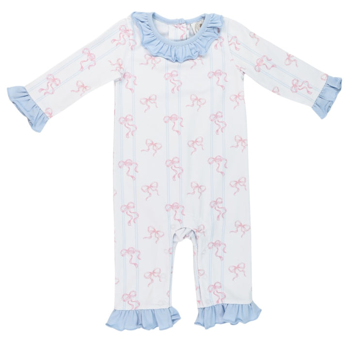 A baby long-sleeve footless romper in white with light blue ruffled trim at the collar, cuffs, and hems, featuring an allover pattern of pink bows, that store