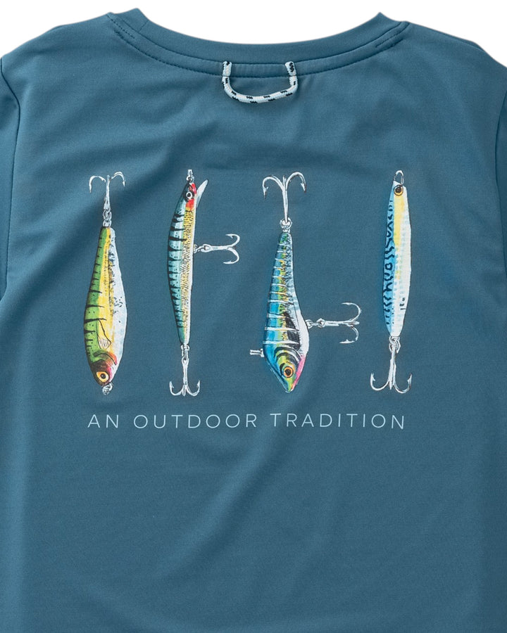 Close-up of a teal blue long-sleeve shirt featuring a graphic of four fishing lures and the text &