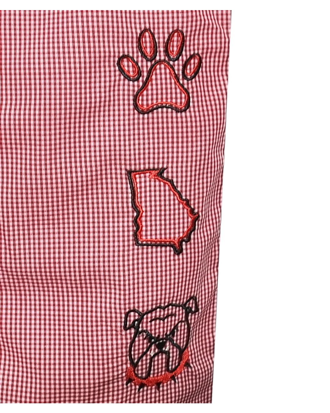 Red checkered fabric with paw print, state outline, and bulldog head designs.