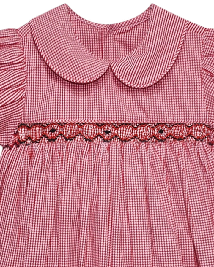 Red checkered dress with smocked neckline on a white background