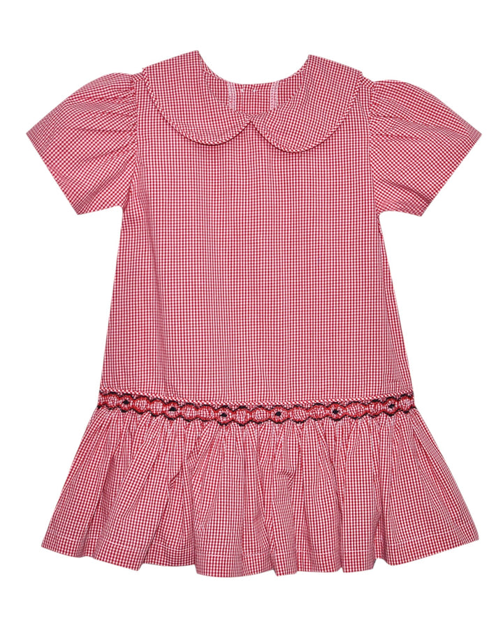 Red checkered dress with a ruffled collar and hem on a white background