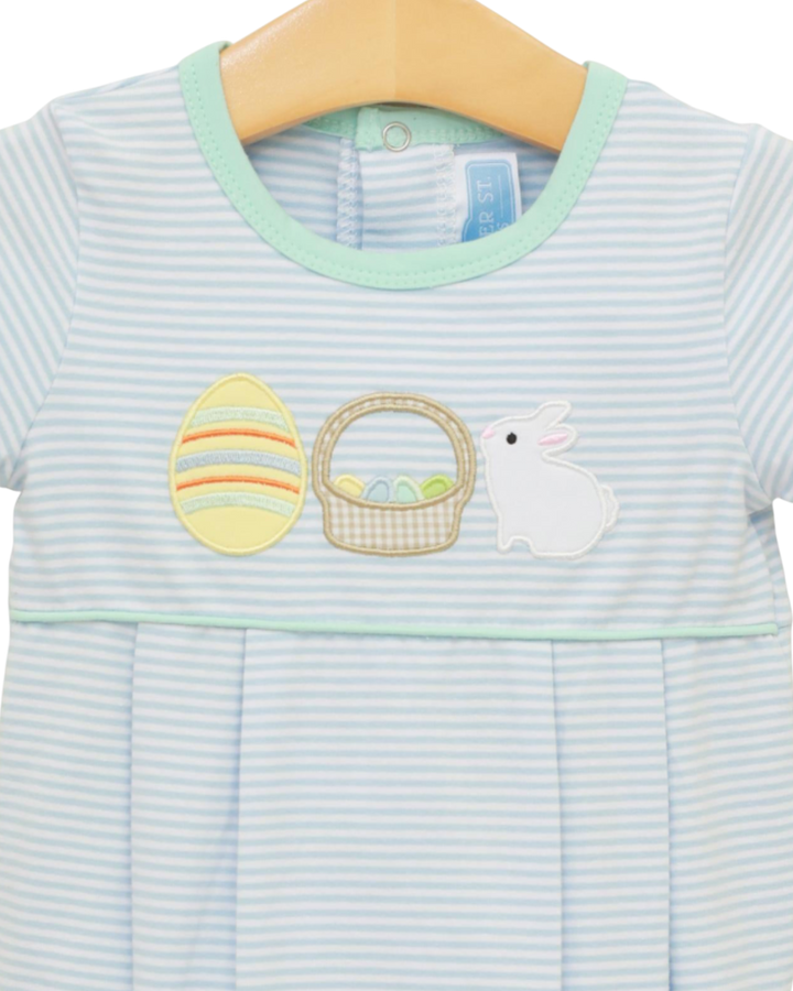 Light blue baby romper with Easter-themed appliqués on a hanger