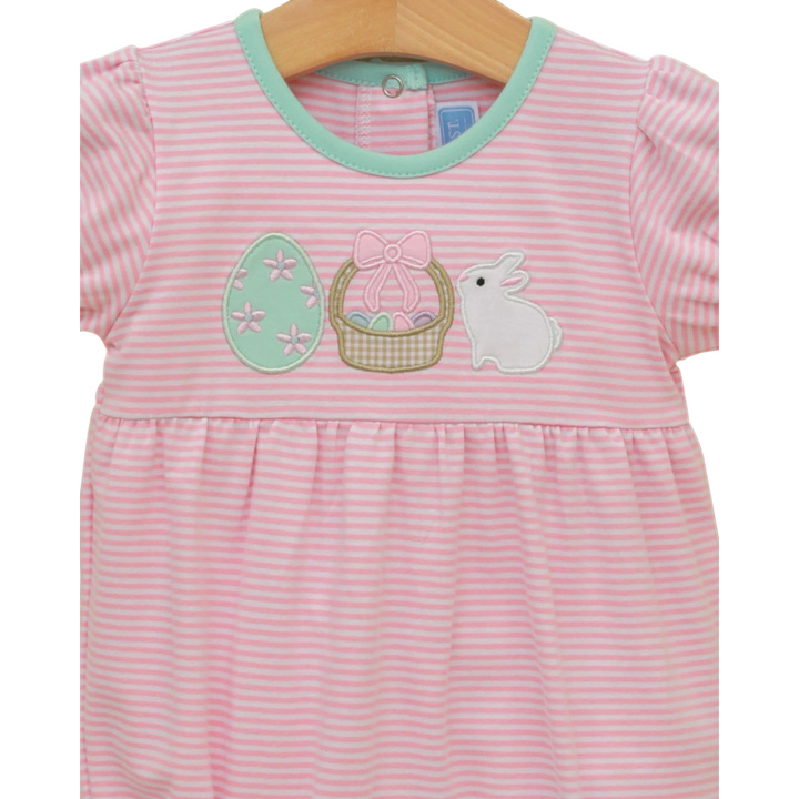 Pink and white striped baby bubble  with Easter-themed appliqués on a wooden hanger.