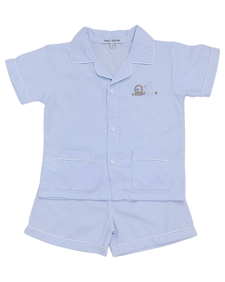 Light blue children's pajama set with a collar and shorts on a white background