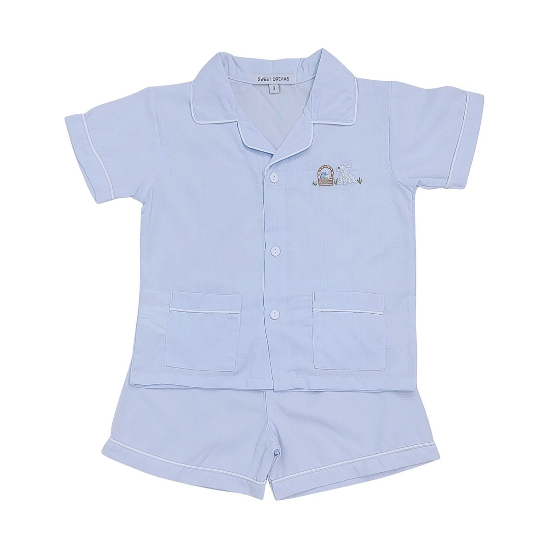 Light blue children's pajama set with a collar and shorts on a white background