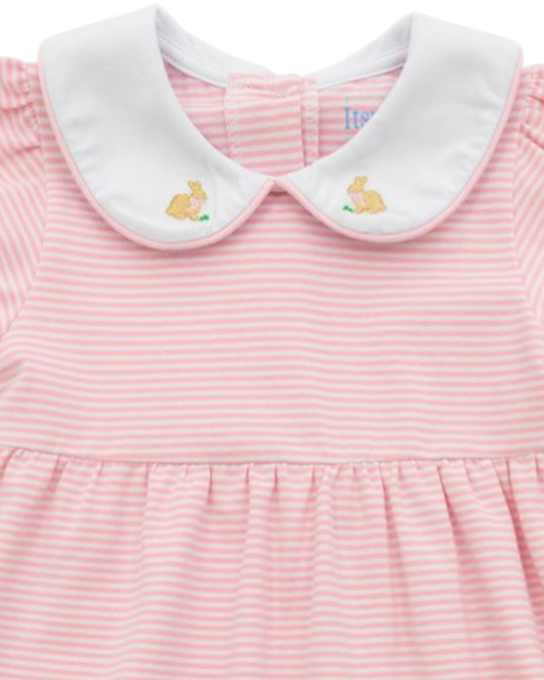 Pink striped dress with white collar featuring embroidered bunnies on a plain background