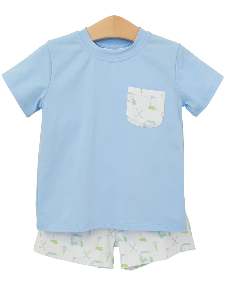 Light blue t-shirt with a pocket and matching shorts on a hanger against a white background