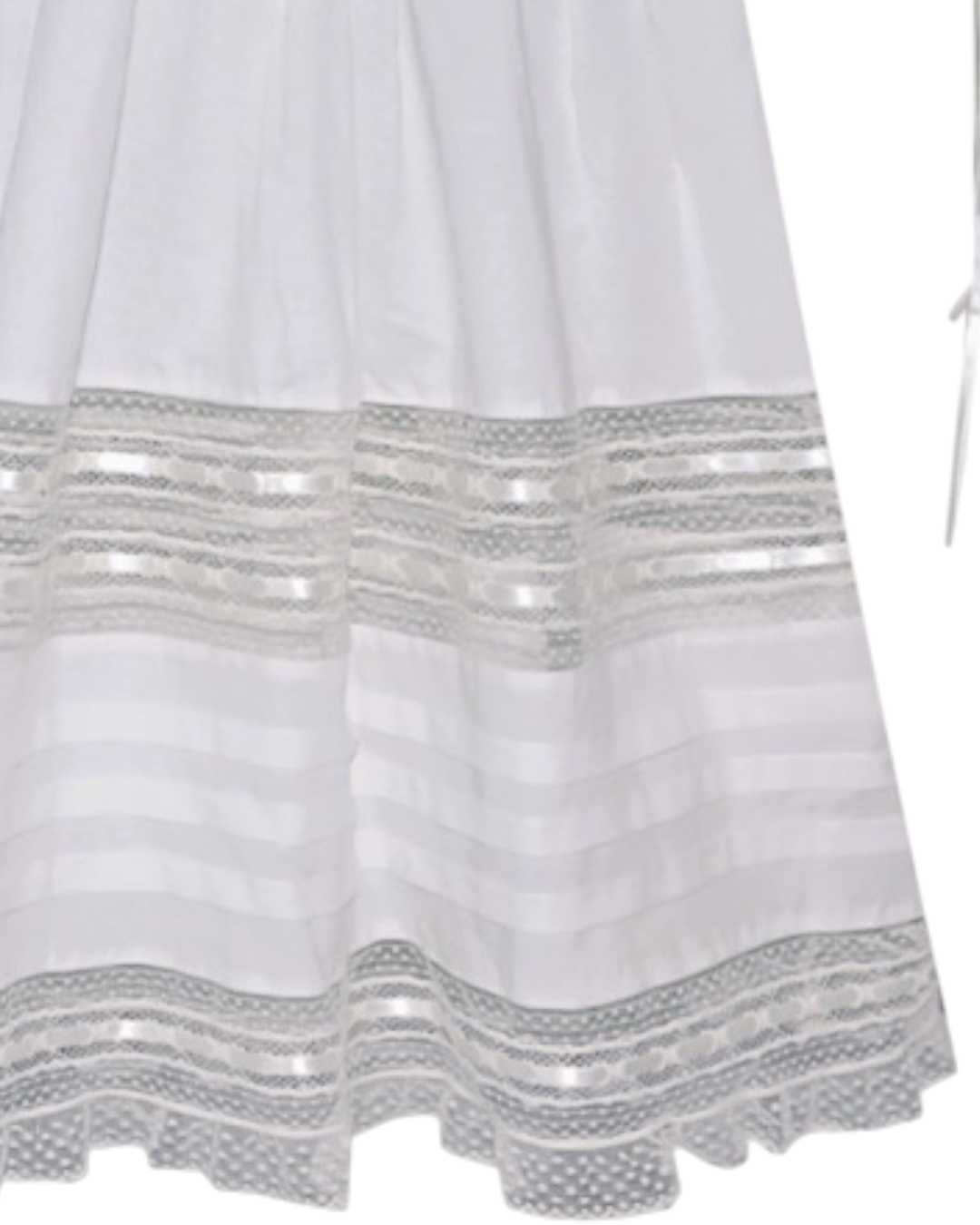White dress with silver embroidery on a white background