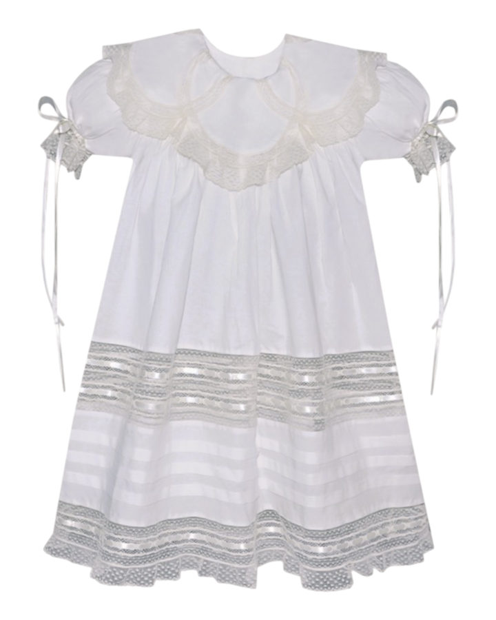 White dress with lace details on a white background