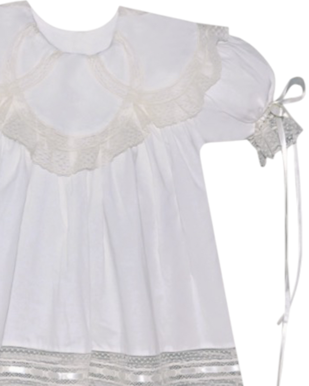White dress with lace details on a white background