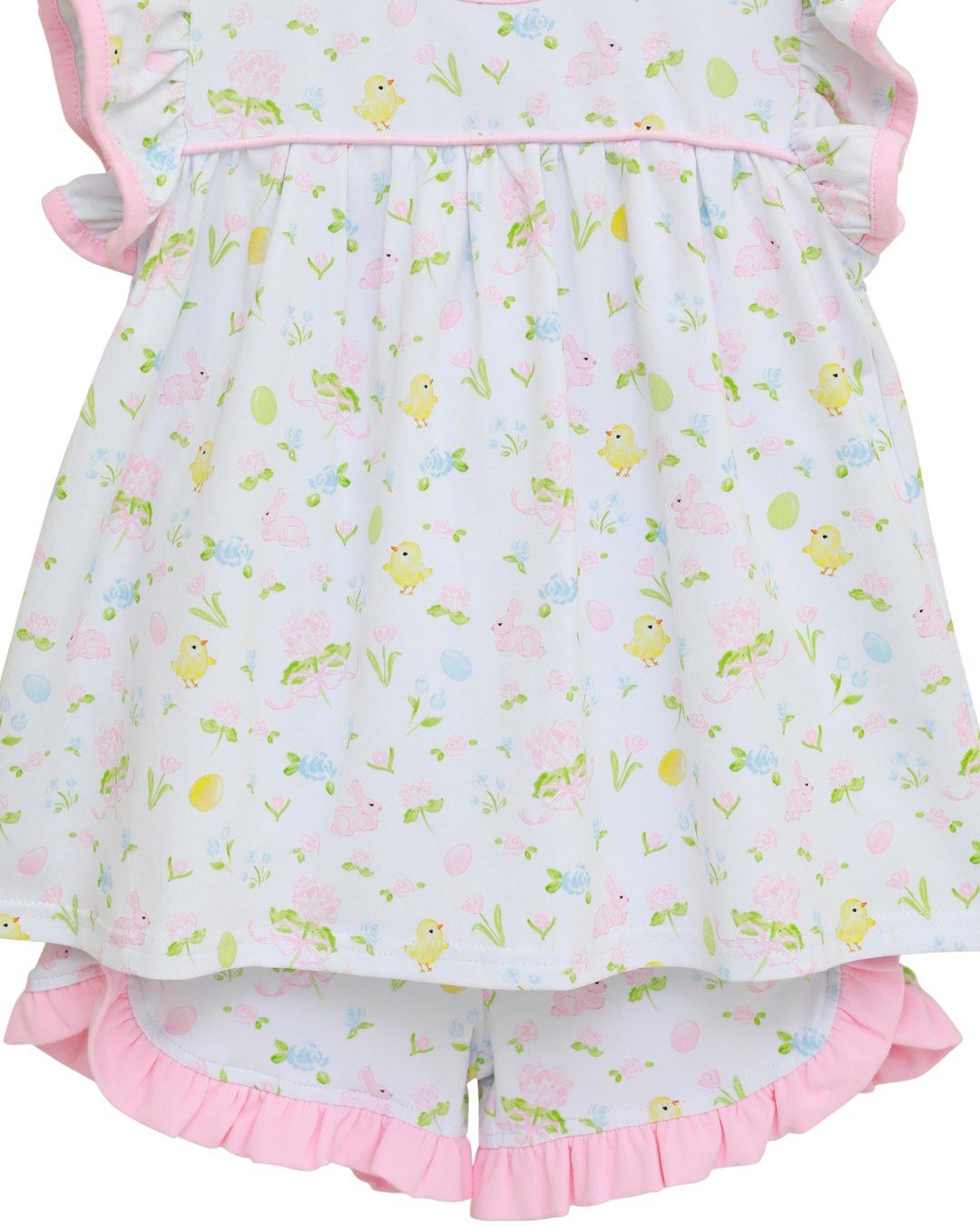 Children's outfit with floral pattern and pink ruffles on a white background
